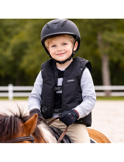 Child wearing Hit-Air Complet 3 Kids airbag vest horse riding safety